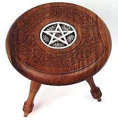 wiccan altar set with a pentacle for wiccan spells and wiccan rituals